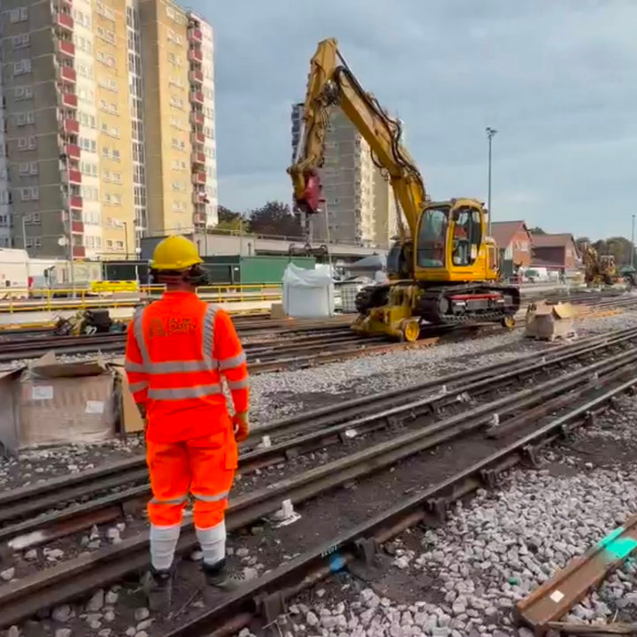 Rail personnel and road-rail plant at an infrastructure worksite