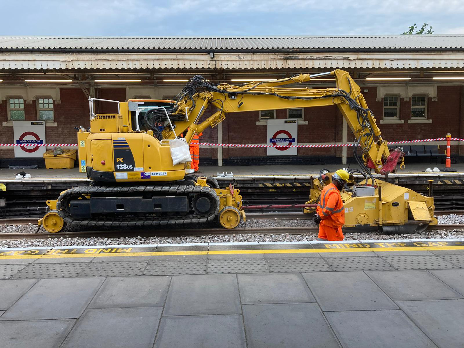 Rail personnel and yellow plant at Ladbroke Grove Underground station